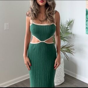 Green Cut-Out Sweater Midi Dress

Fit is a S/M